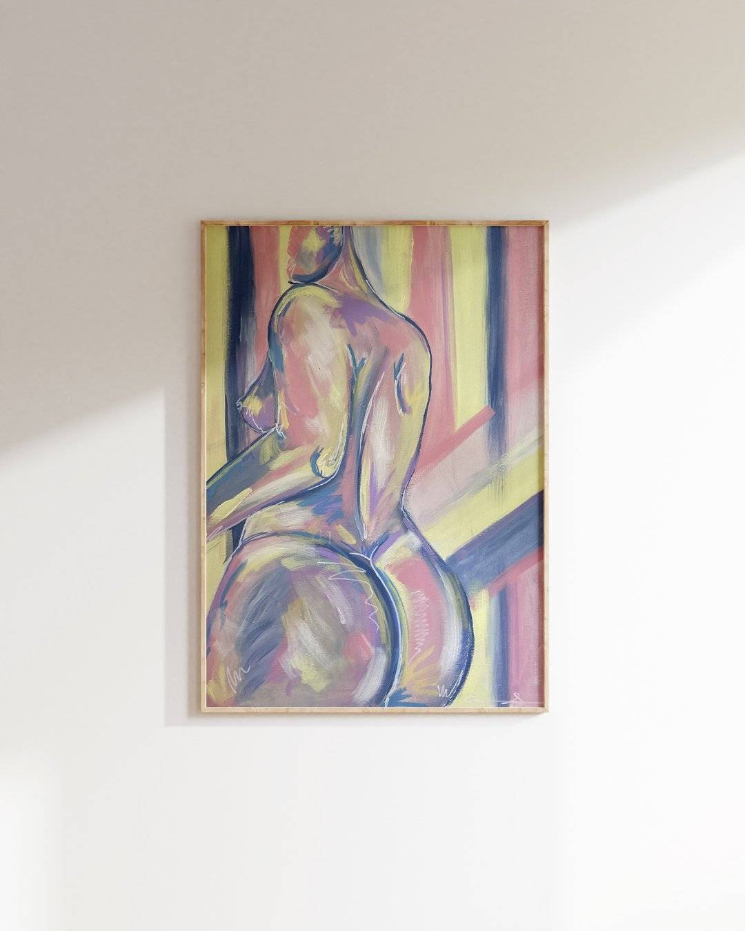 a painting hanging on the wall of a room