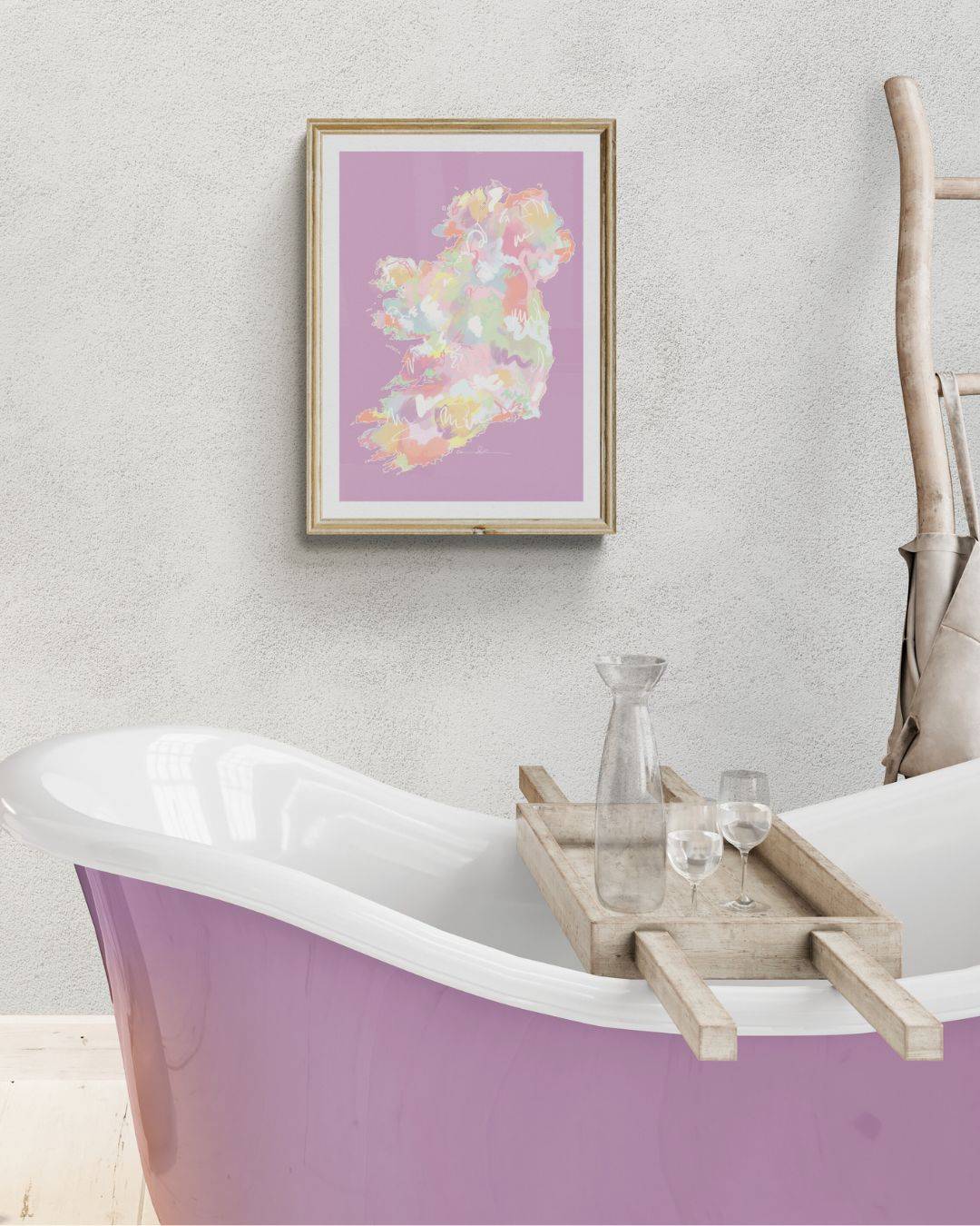 a bathroom with a bathtub and a painting on the wall